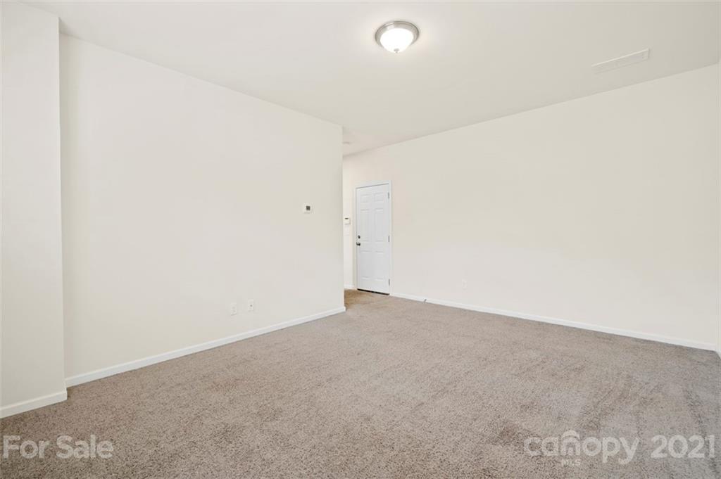 206 Butterfly Place, Unit 185 Tega Cay, SC 29708 - Photo 36 of 36 a view of an empty room