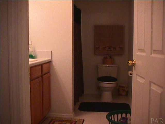 5334 Sewell Road Milton, FL 32570 - Photo 3 of 7 a bathroom with a sink