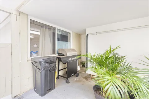 a workspace with furniture and a window