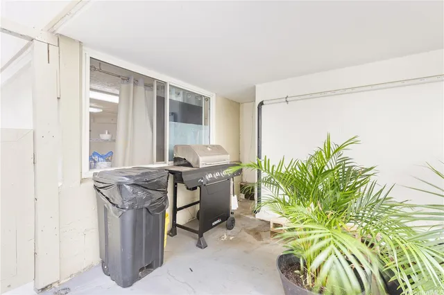 a workspace with furniture and a window
