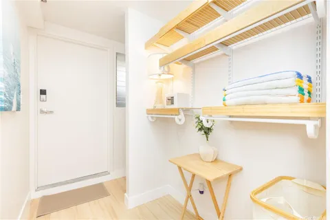 a room with a sink and a mirror