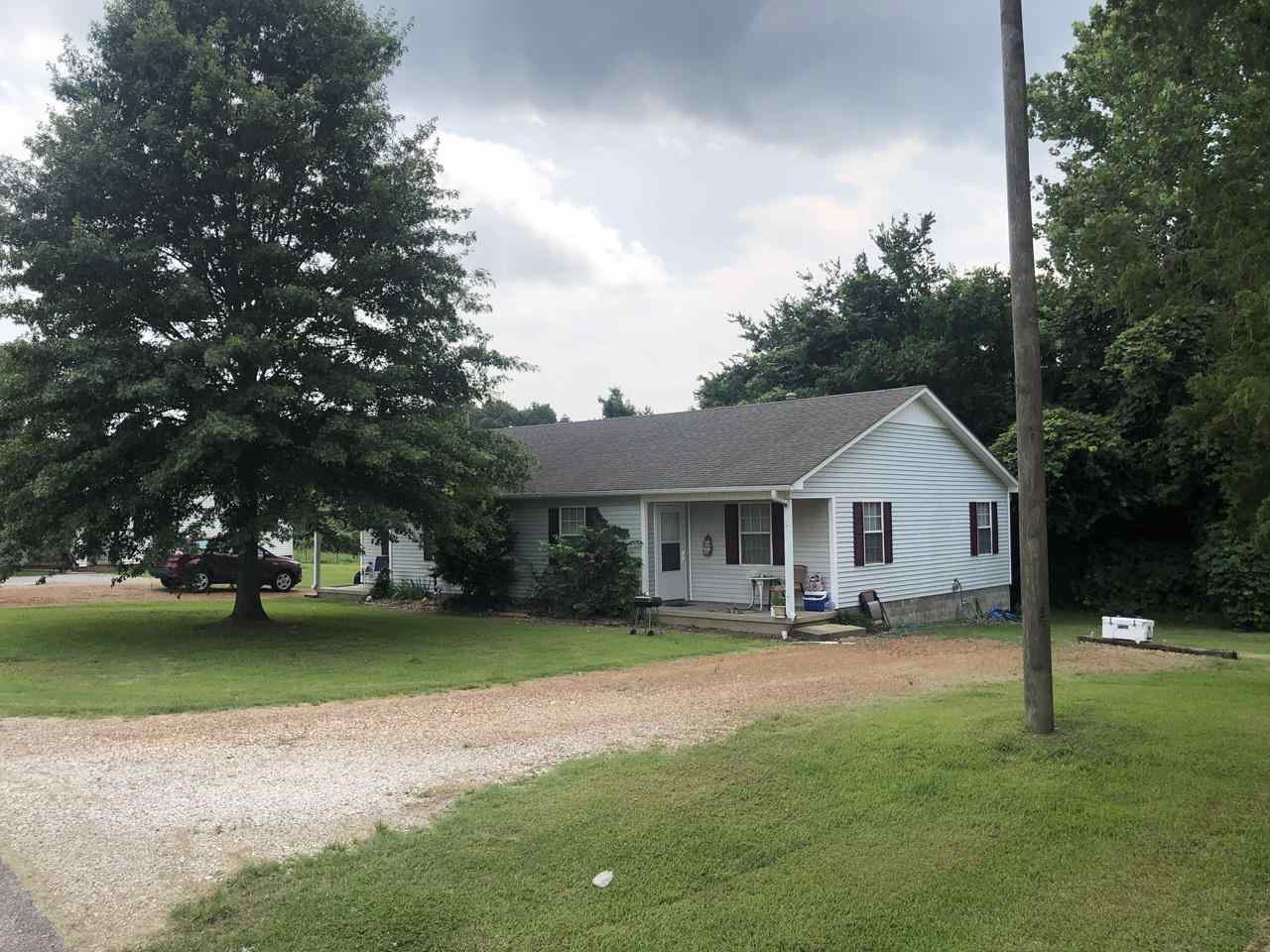 Barlow-chisholm Lake Road Ripley, TN 38063 - Photo 3 of 13 a view of a house with a yard