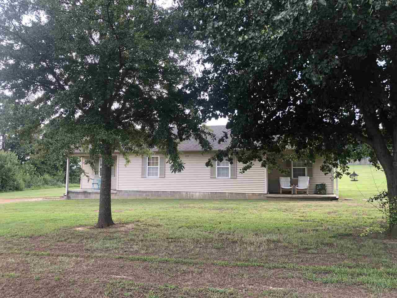 Barlow-chisholm Lake Road Ripley, TN 38063 - Photo 4 of 13 a front view of a house with a yard
