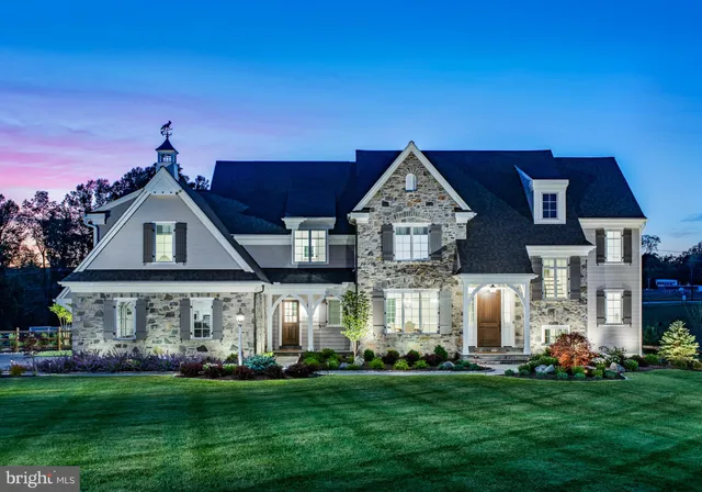a view of livingroom with furniture staircase and kitchen view