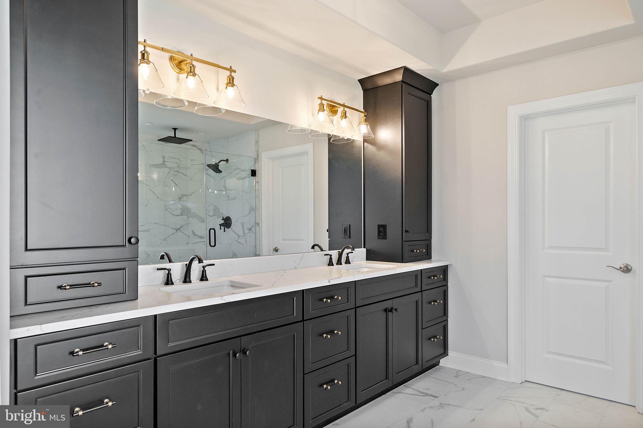 Lot B Howell Road Malvern, PA 19355 - Photo 31 of 46 a bathroom with a double vanity sink and mirror with shower