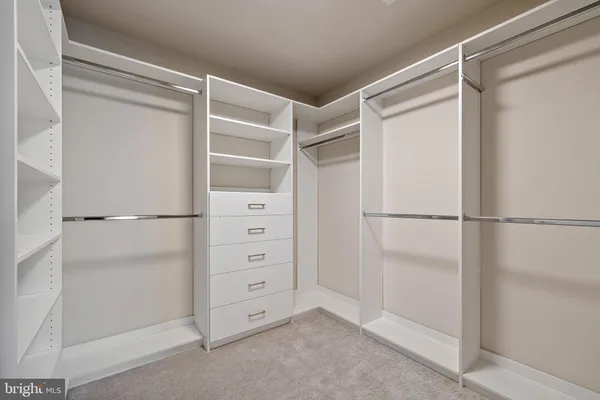 a view of an empty walk in closet
