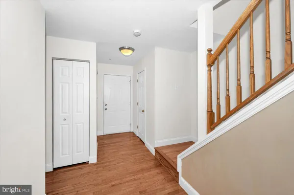 an empty room with closet area