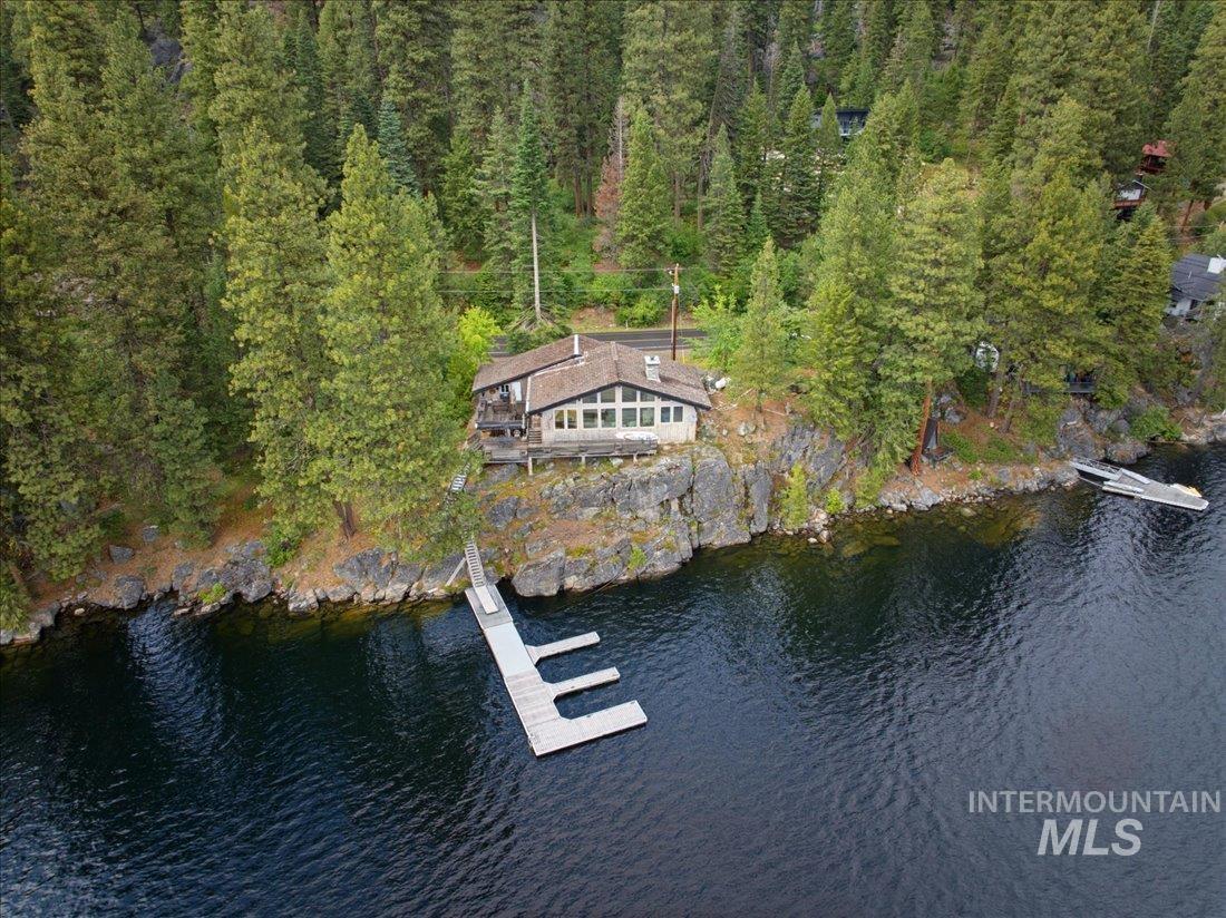 3800 Warren Wagon Road McCall, ID 83638 - Photo 44 of 50 Waterfront property featuring a private dock, natural rock outcroppings, and mature evergreen trees