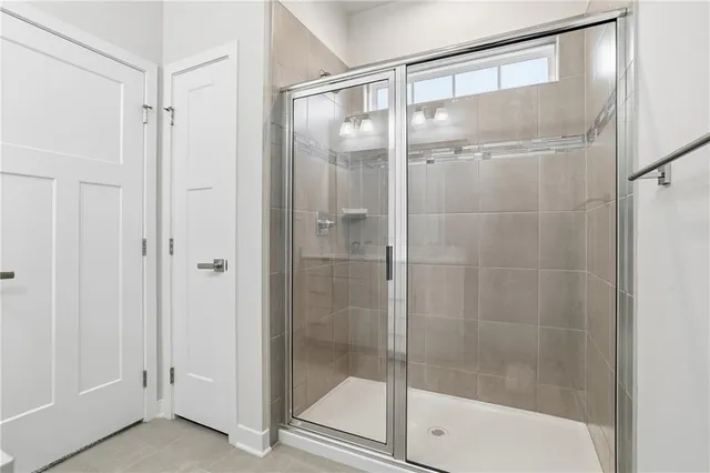 an empty room with closet area