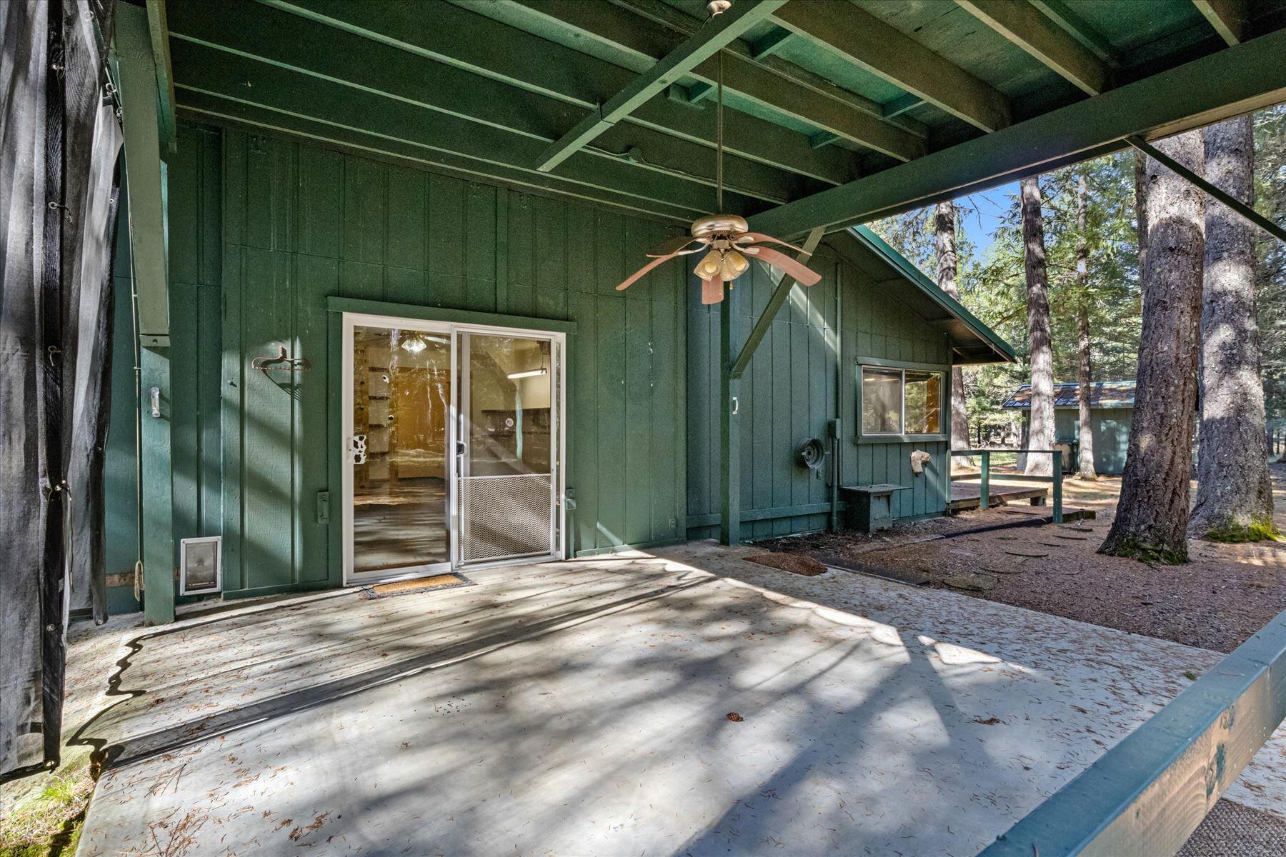 4455 Dick George Road Cave Junction, OR 97523 - Photo 6 of 32 COVERED DOWNSTAIRS PATIO