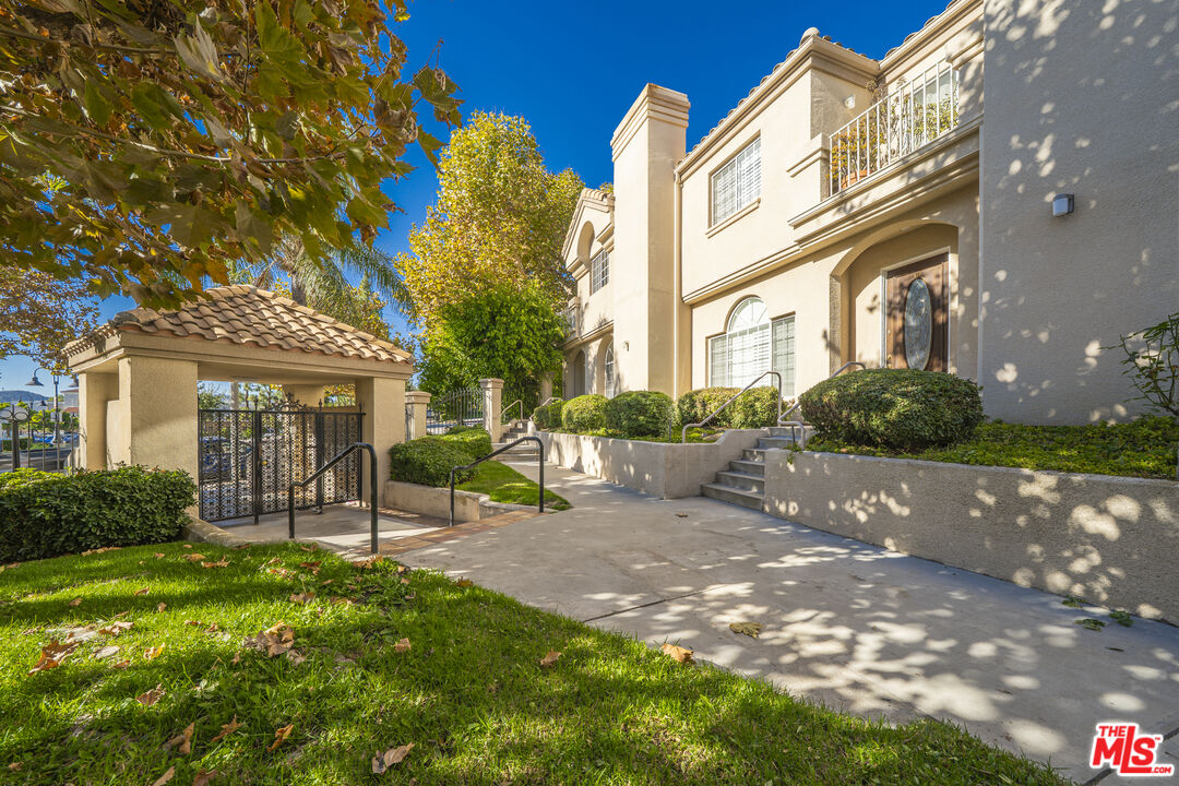 4520 Pennsylvania Avenue, Unit 119 La Crescenta, CA 91214 - Photo 13 of 13 a view of a building with a yard