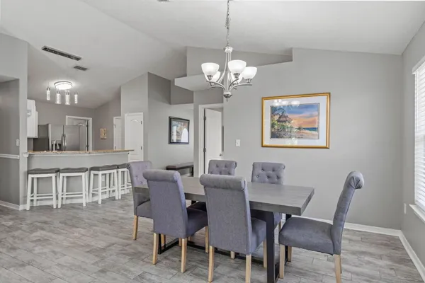 a kitchen with a sink cabinets and window