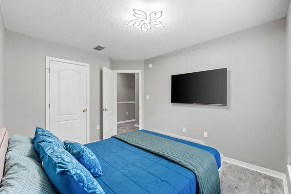 a view of a patio with couches and a fire pit