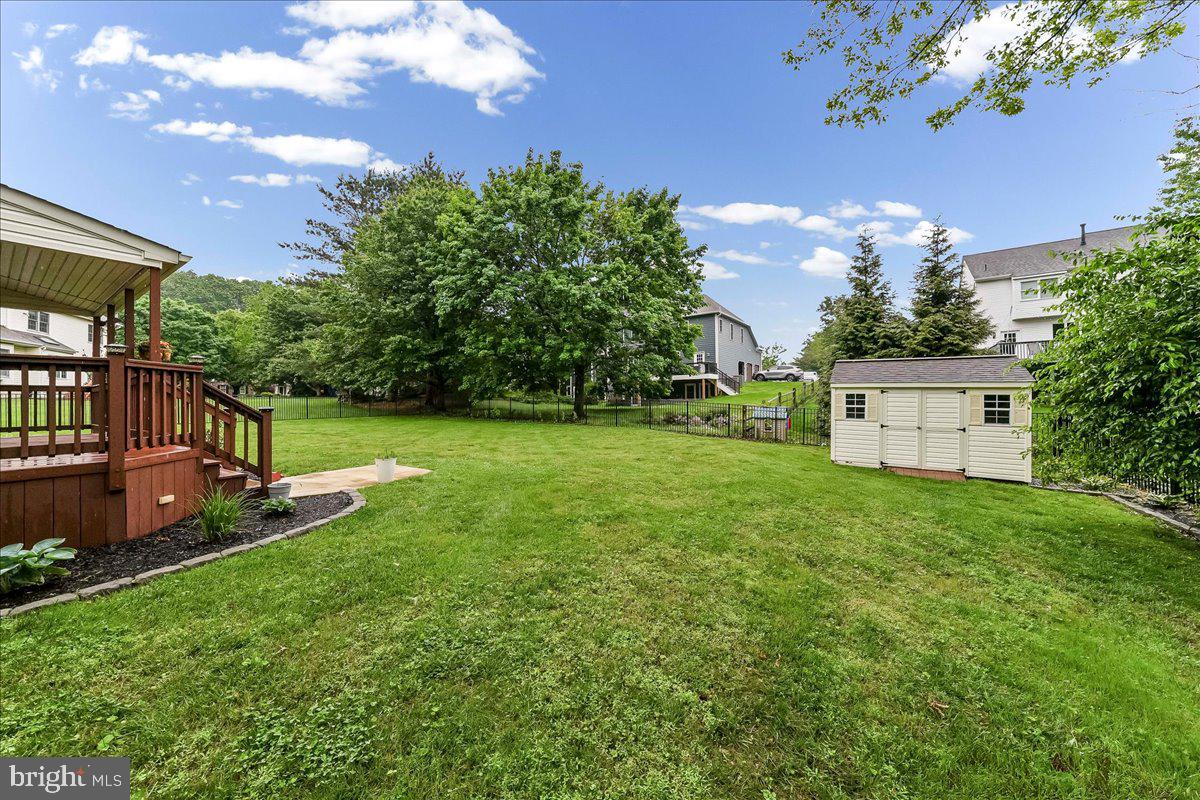 408 Brentford Road Kennett Square, PA 19348 - Photo 37 of 41 a view of a house with backyard and a sitting area