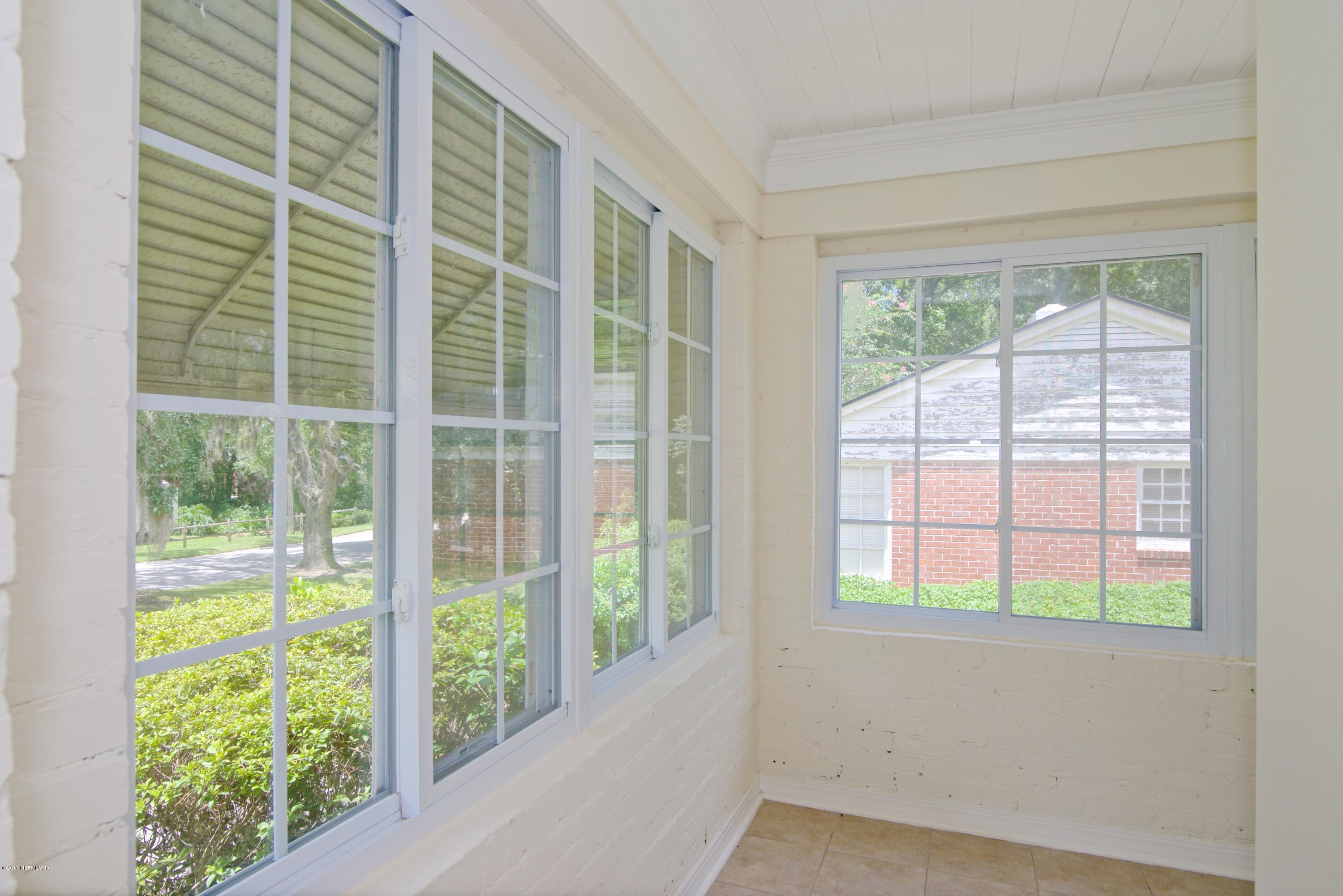 3877 Gadsden Road Jacksonville, FL 32207 - Photo 14 of 24 a view of an empty room with a window