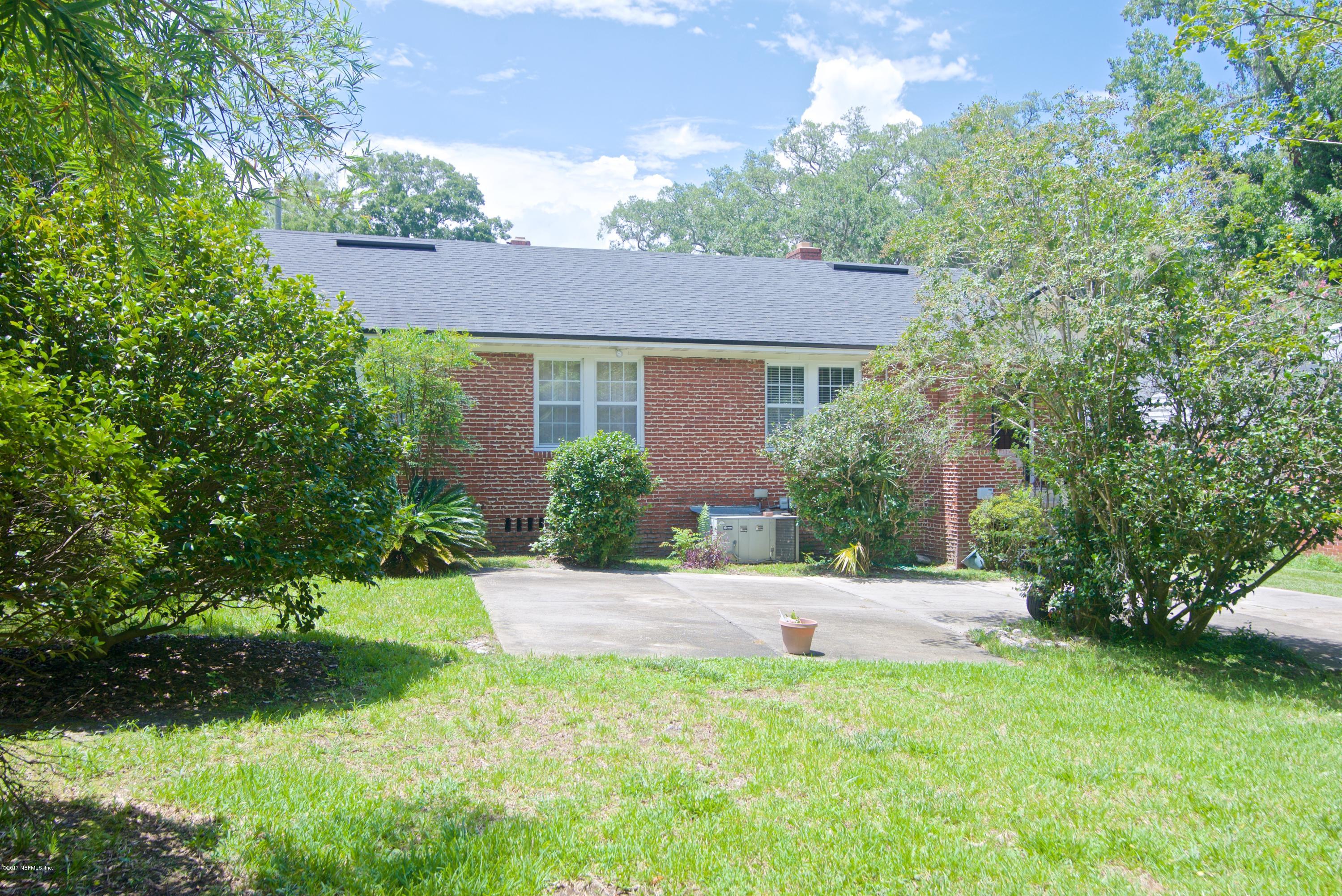 3877 Gadsden Road Jacksonville, FL 32207 - Photo 24 of 24 a view of a house with a yard