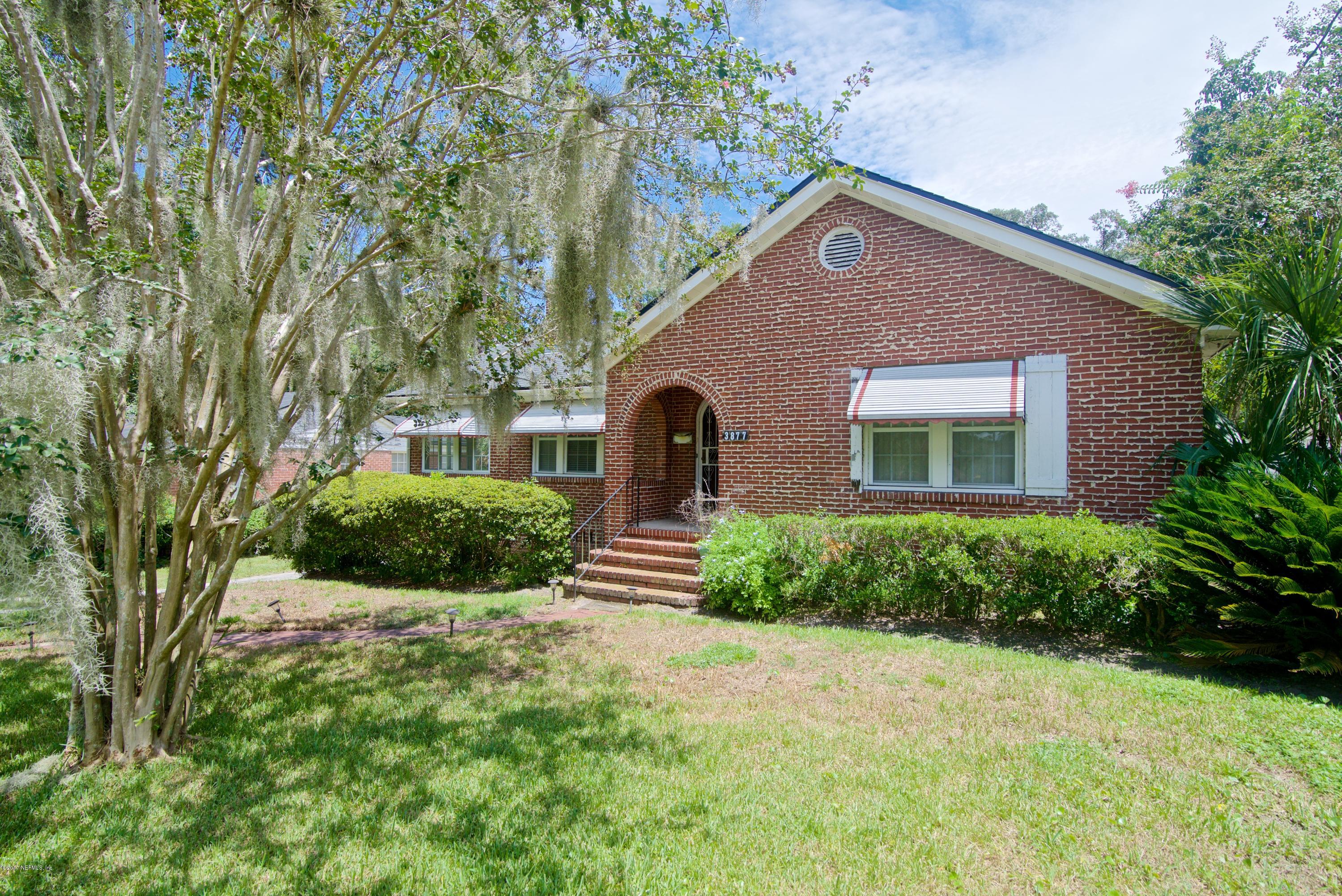 3877 Gadsden Road Jacksonville, FL 32207 - Photo 3 of 24 a front view of a house with garden