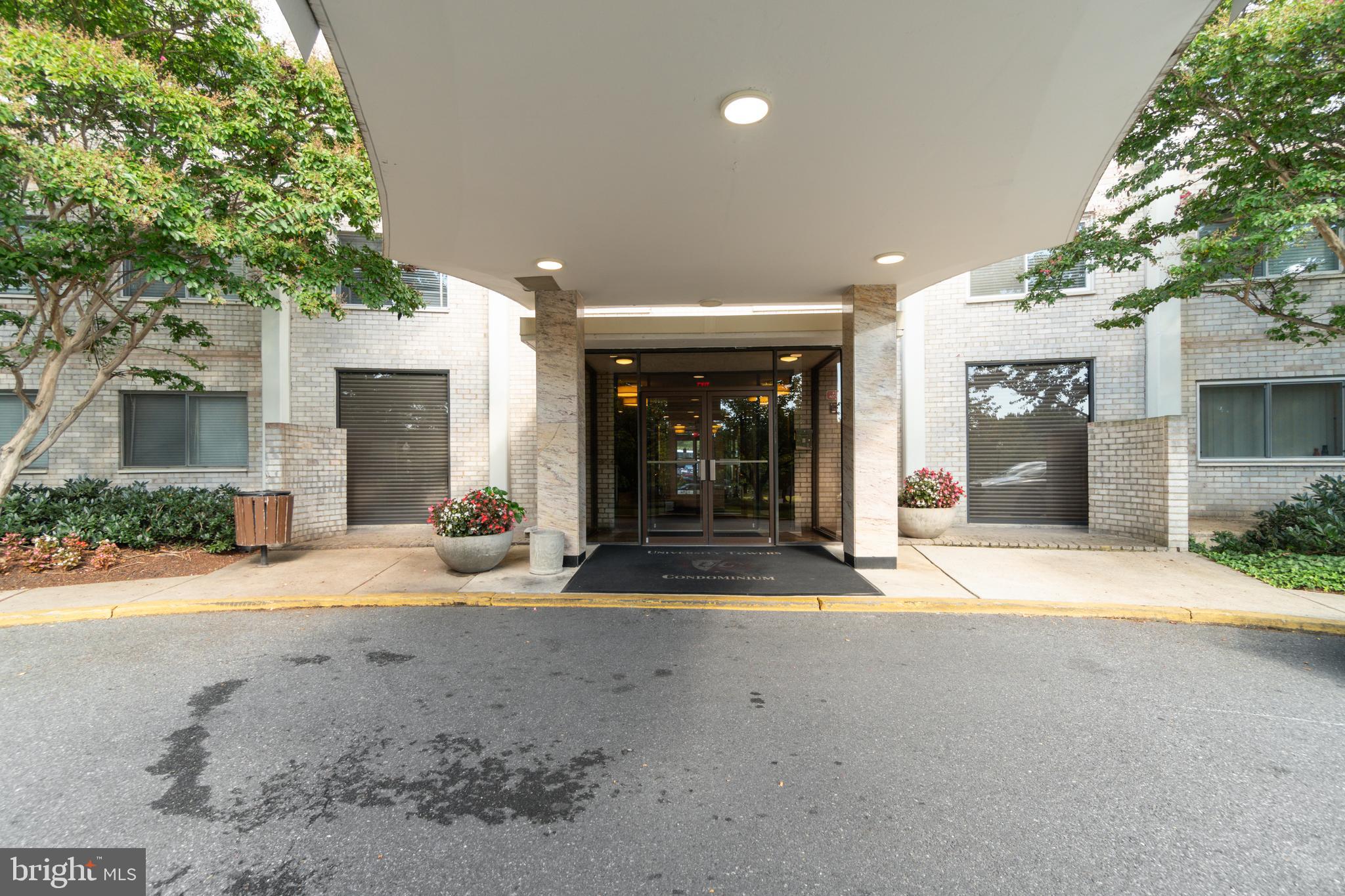 1111 University Boulevard West, Unit 813A Silver Spring, MD 20902 - Photo 21 of 22 a view of a house with a patio