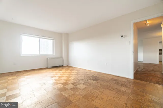 a view of an empty room and window