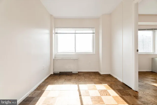 a view of a room that has a window