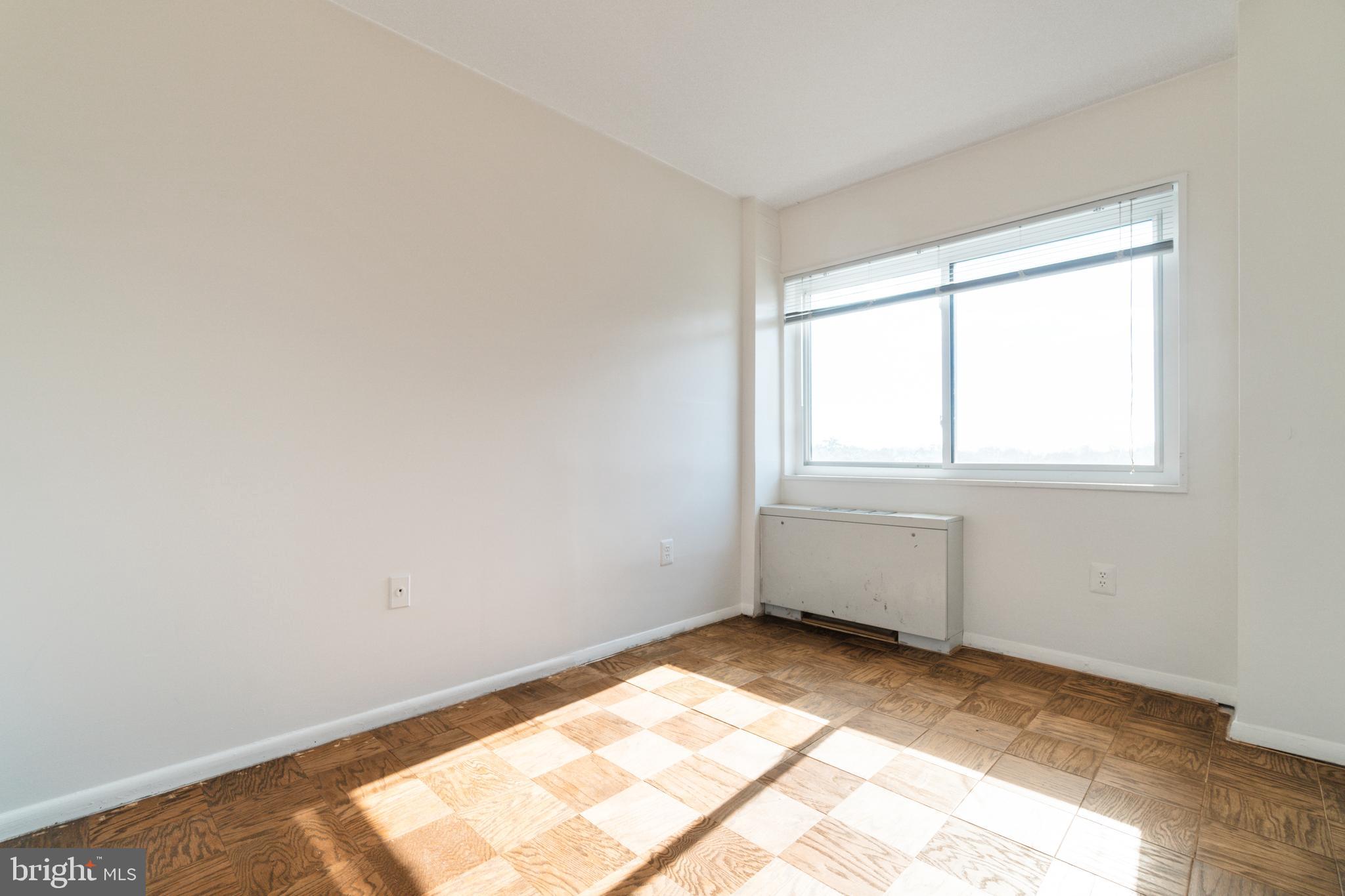 1111 University Boulevard West, Unit 813A Silver Spring, MD 20902 - Photo 10 of 22 a view of room and window