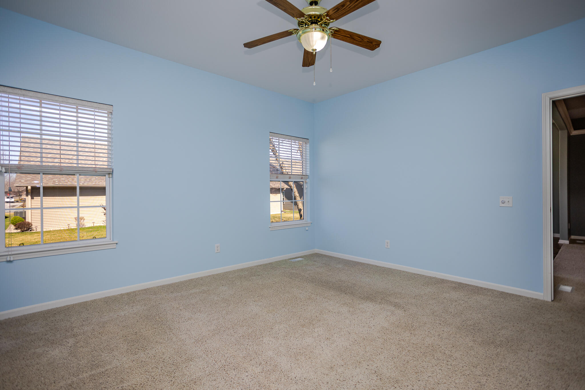 350 Cochran Drive Crown Point, IN 46307 - Photo 17 of 37 an empty room with windows and fan