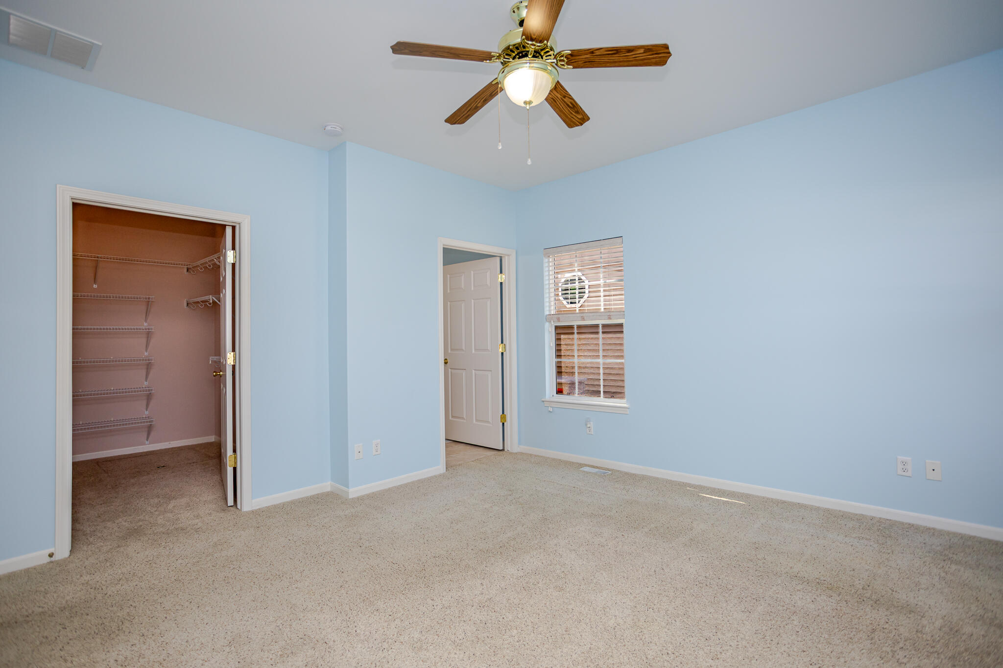 350 Cochran Drive Crown Point, IN 46307 - Photo 21 of 37 an empty room with windows and fan