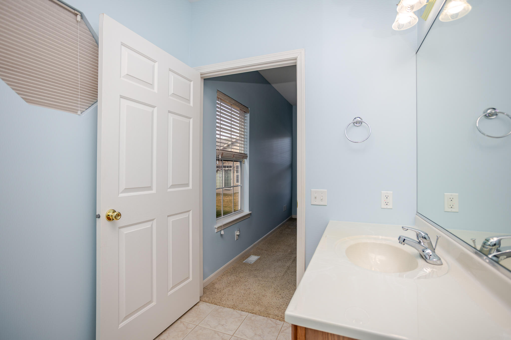 350 Cochran Drive Crown Point, IN 46307 - Photo 24 of 37 a bathroom with a sink and a mirror