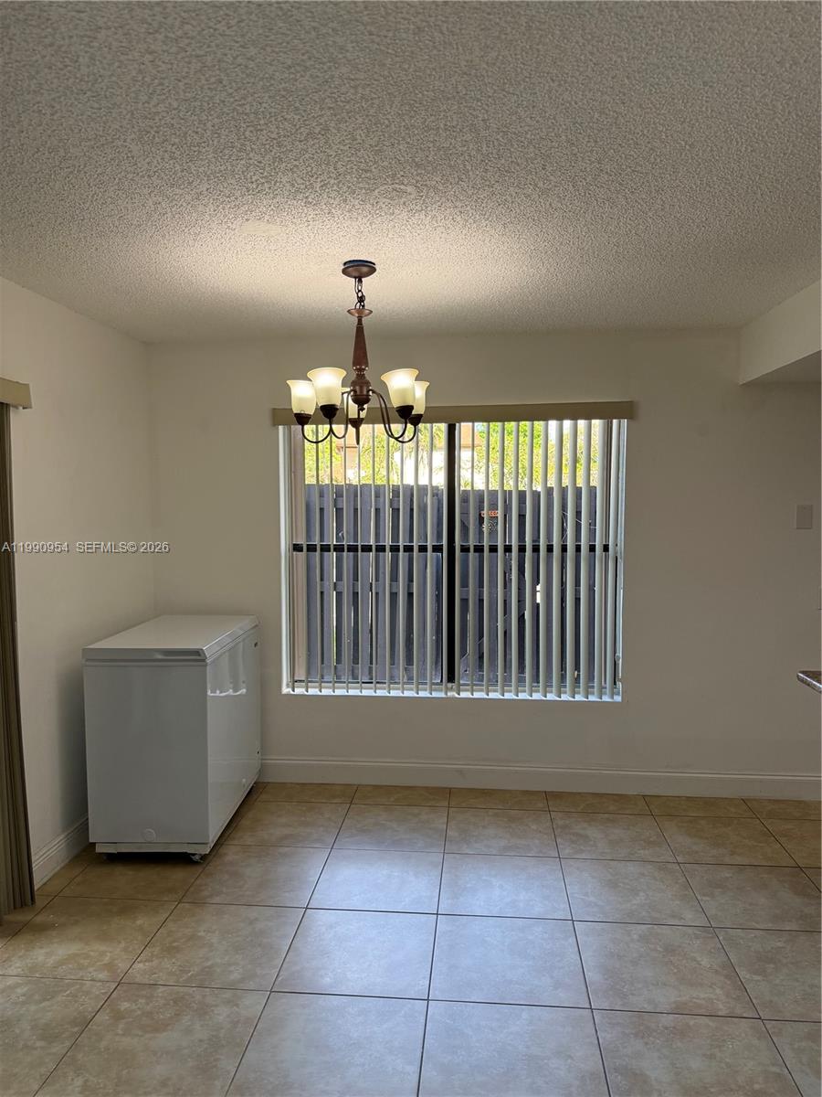 4825 Southwest 149th Court, Unit 18B Miami, FL 33185 - Photo 14 of 36 a view of entryway