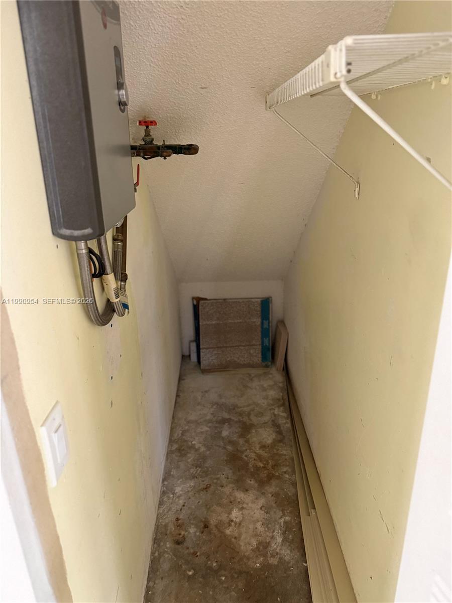 4825 Southwest 149th Court, Unit 18B Miami, FL 33185 - Photo 18 of 36 a view of a walk in closet