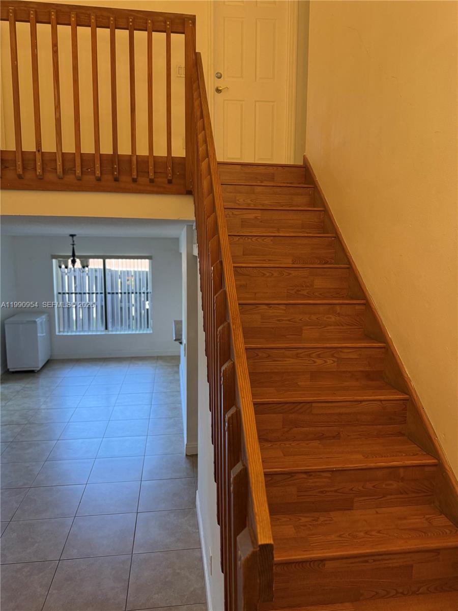 4825 Southwest 149th Court, Unit 18B Miami, FL 33185 - Photo 19 of 36 a view of entryway with wooden floor