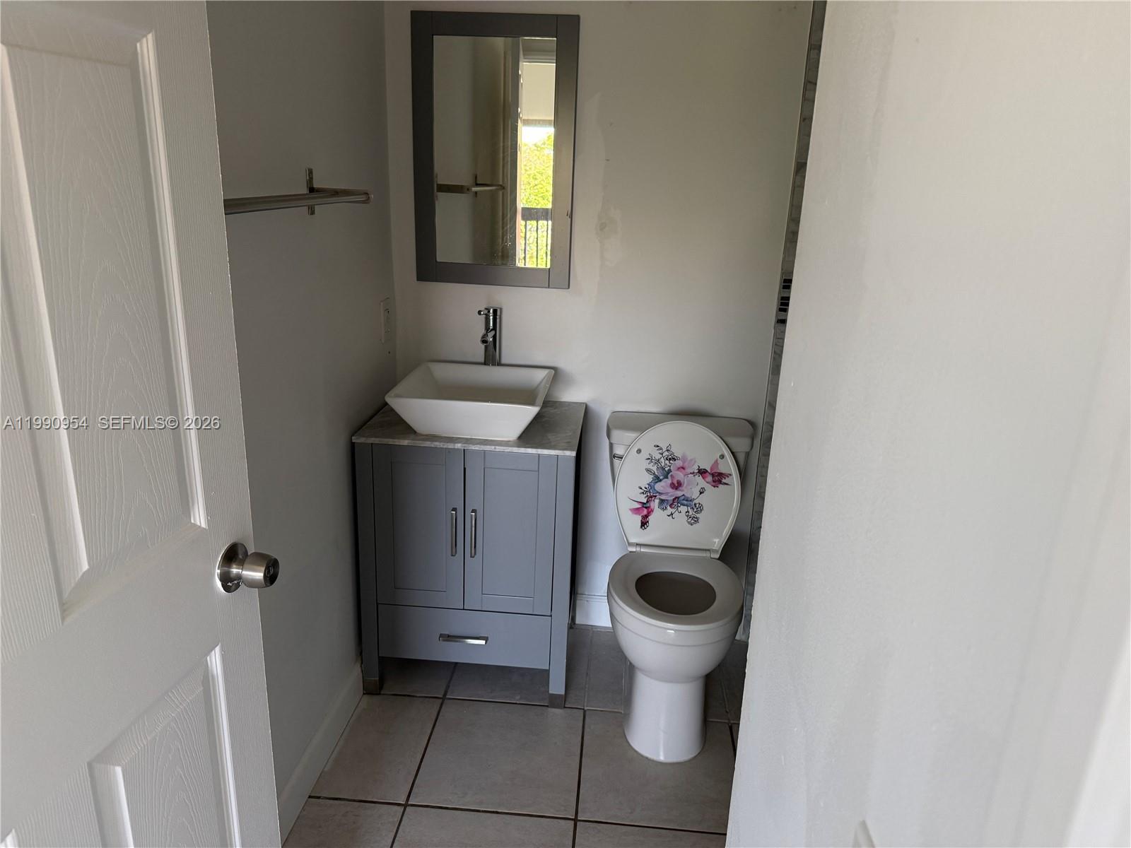4825 Southwest 149th Court, Unit 18B Miami, FL 33185 - Photo 24 of 36 a utility room with dryer and washer