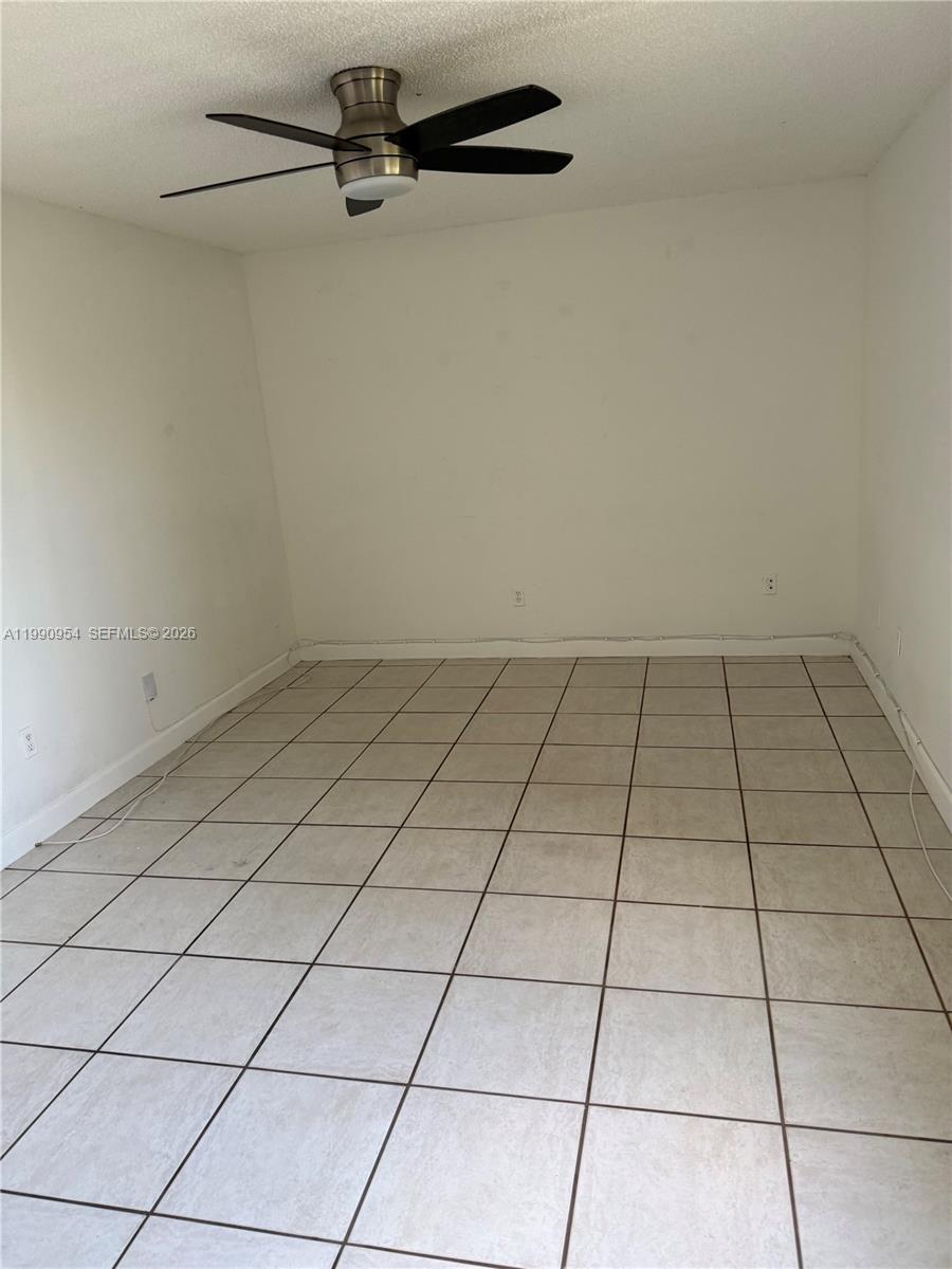 4825 Southwest 149th Court, Unit 18B Miami, FL 33185 - Photo 29 of 36 a view of a refrigerator and window