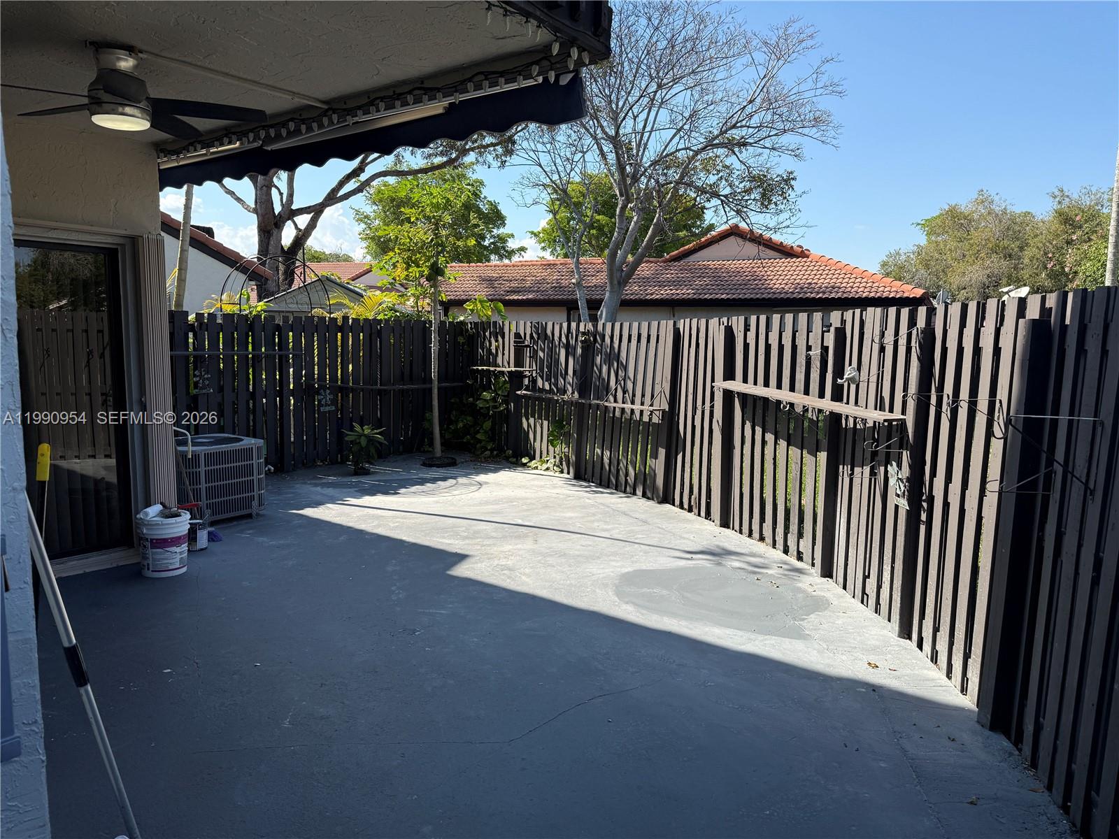 4825 Southwest 149th Court, Unit 18B Miami, FL 33185 - Photo 33 of 36 a front view of a house having patio