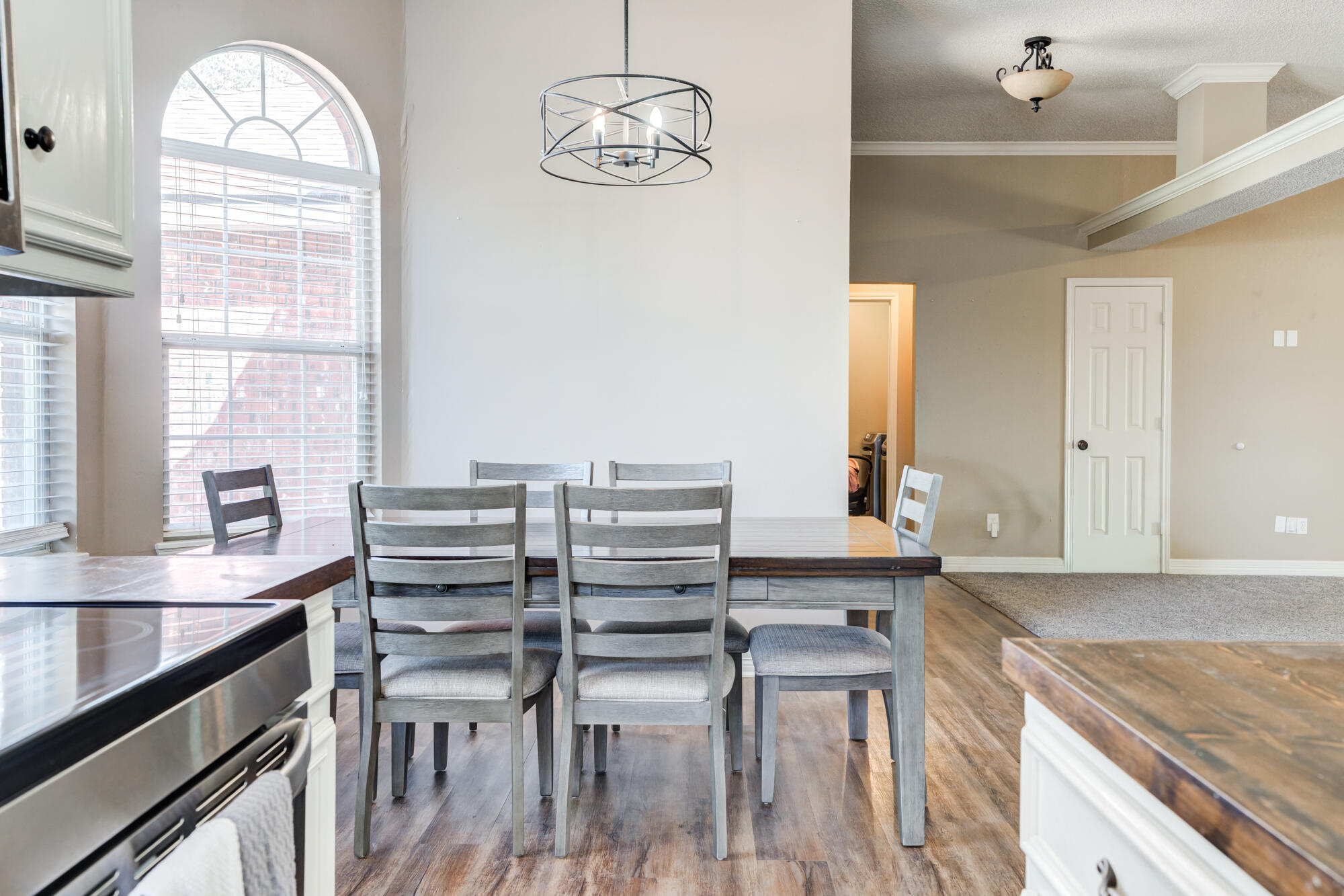 2807 87th Street Lubbock, TX 79423 - Photo 19 of 38 a view of a kitchen with furniture and window