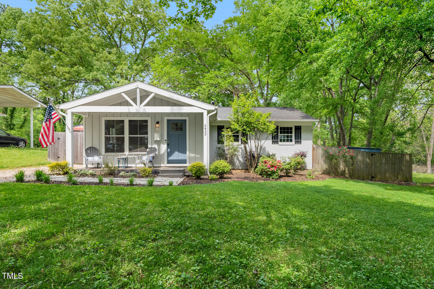 2433 Kennington Road Raleigh, NC 27610 - Photo 1 of 32 a front view of house with yard and outdoor seating
