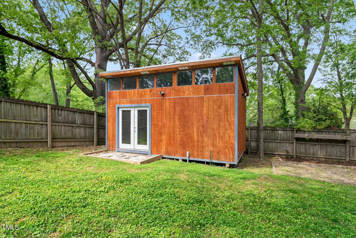 2433 Kennington Road Raleigh, NC 27610 - Photo 27 of 32 a front view of a house with a yard