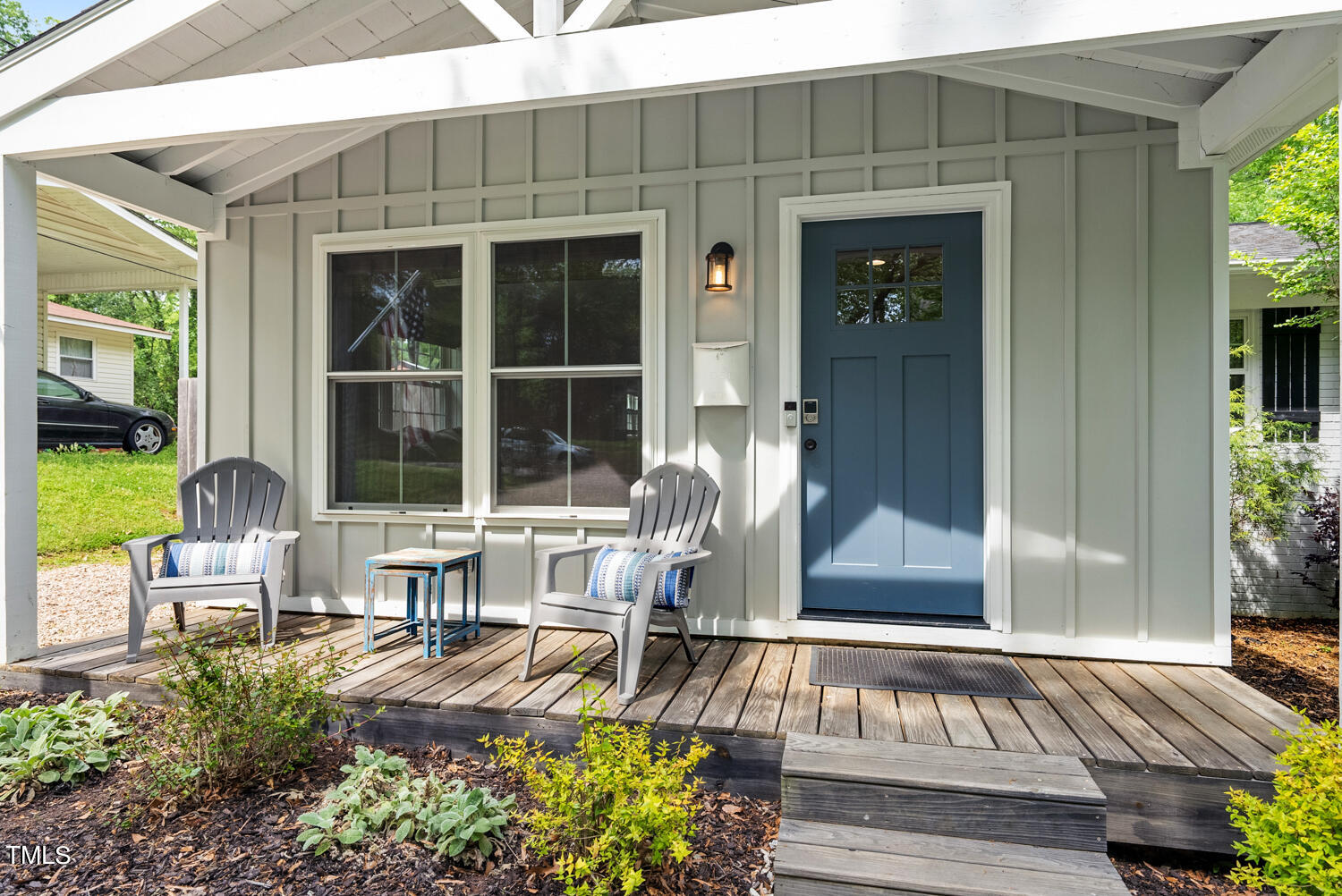 2433 Kennington Road Raleigh, NC 27610 - Photo 3 of 32 a view of a patio with table and chairs and potted plants
