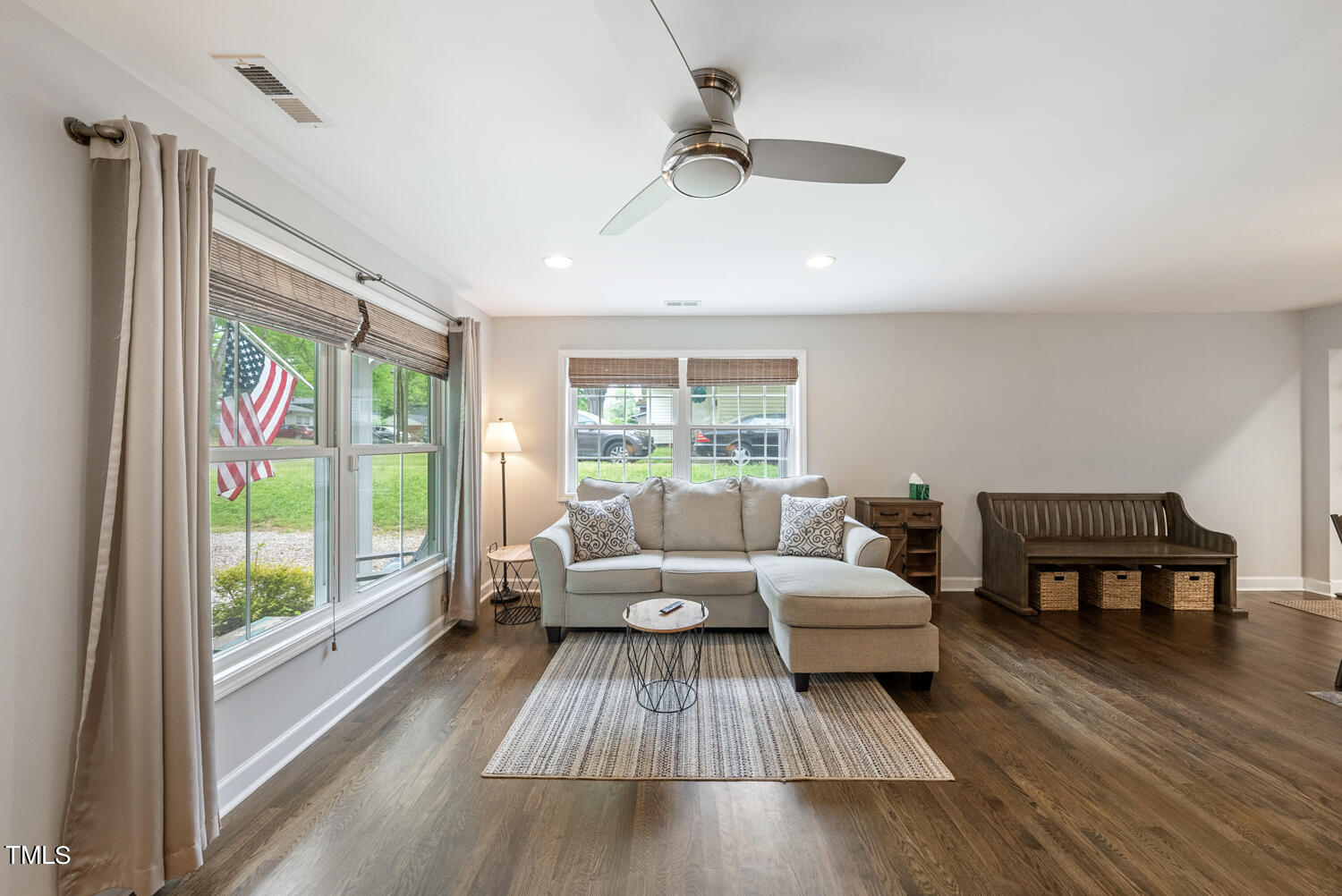 2433 Kennington Road Raleigh, NC 27610 - Photo 5 of 32 a living room with furniture and a large window