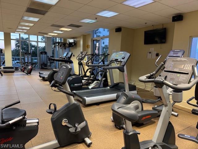 20 Seagate Drive, Unit 703 Naples, FL 34103 - Photo 16 of 19 a view of a room with gym equipment