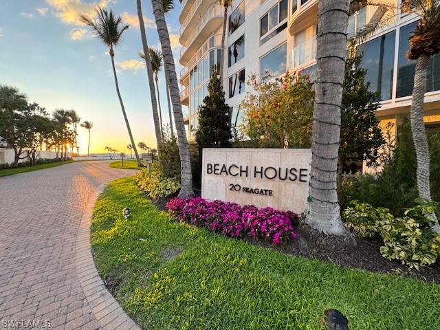 20 Seagate Drive, Unit 703 Naples, FL 34103 - Photo 2 of 19 a sign on the side of the road