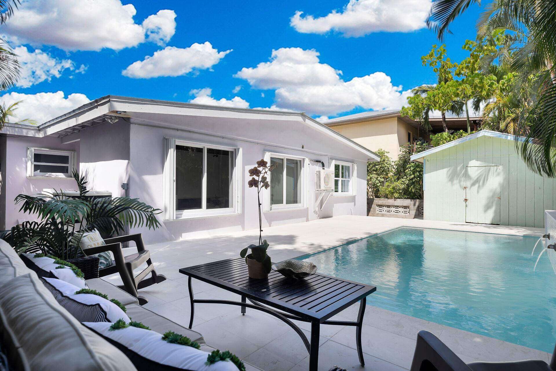 3722 Cindy Avenue Key West, FL 33040 - Photo 1 of 38 a view of a house with swimming pool and sitting area