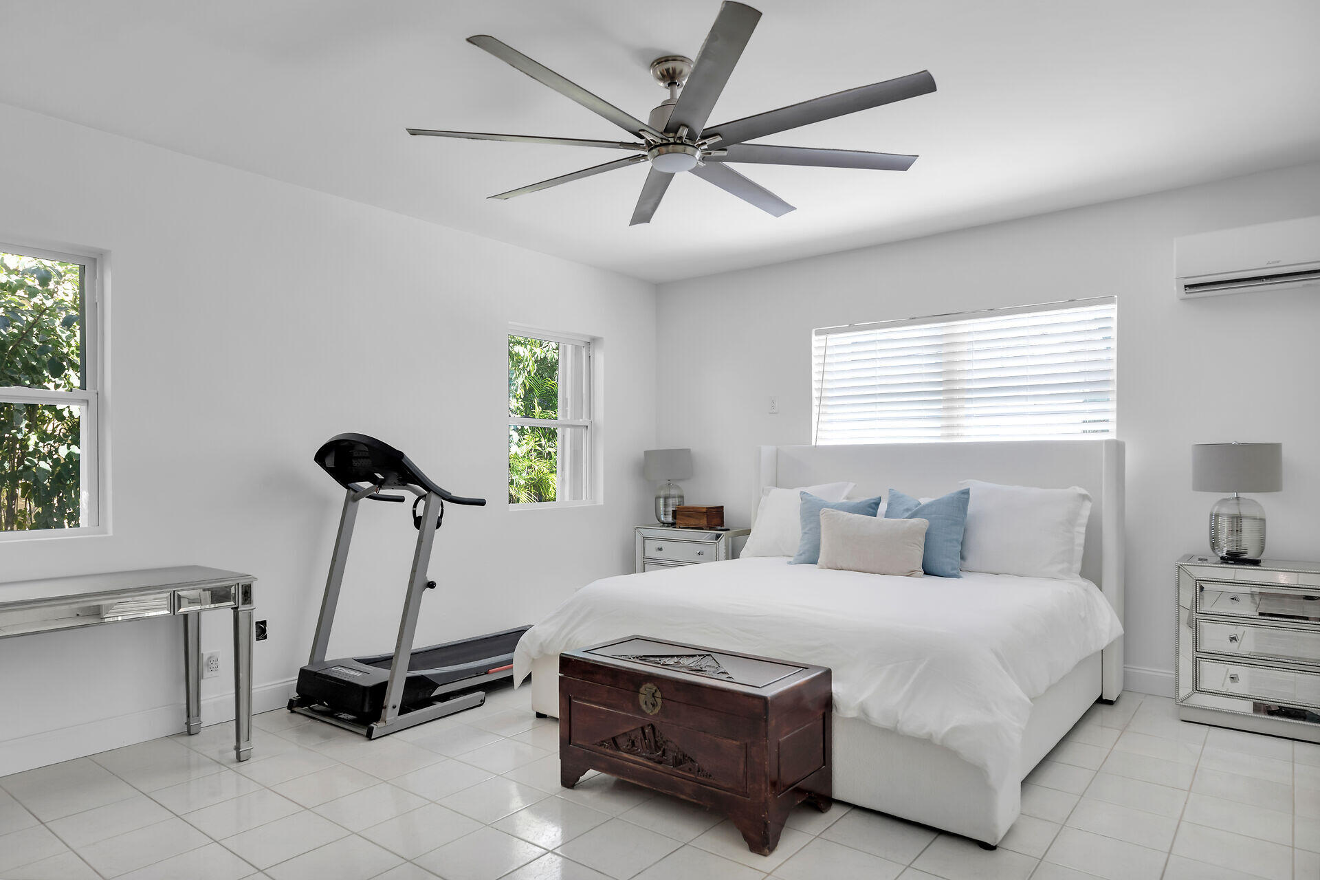 3722 Cindy Avenue Key West, FL 33040 - Photo 20 of 38 a bedroom with a bed and a chandelier