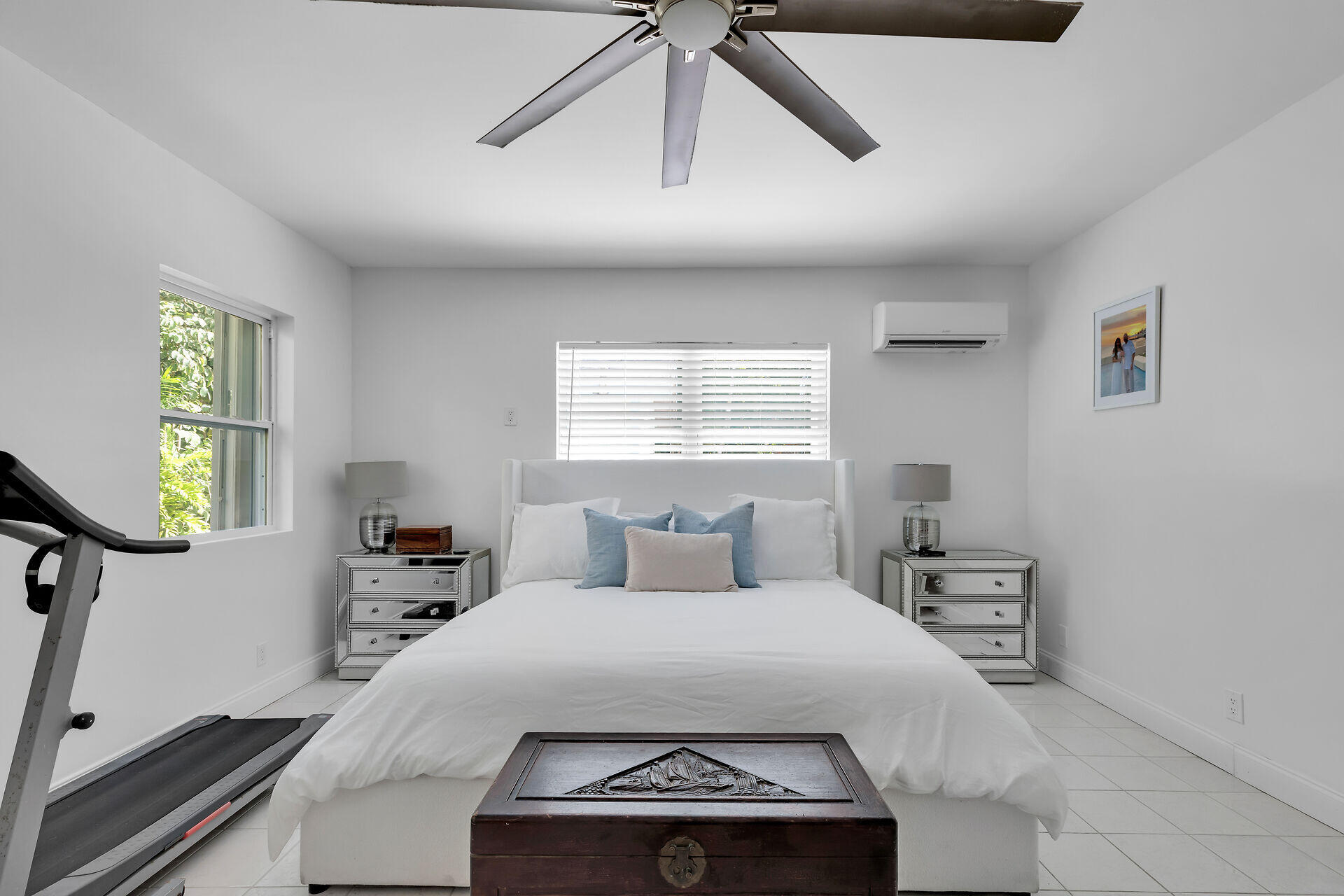 3722 Cindy Avenue Key West, FL 33040 - Photo 23 of 38 a bedroom with a bed a dresser and window