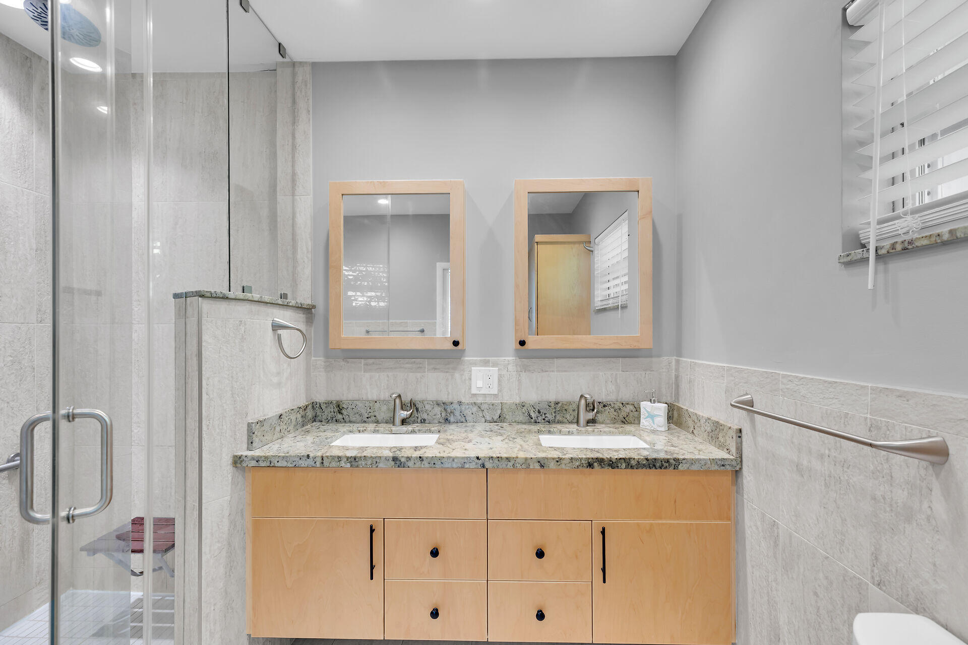 3722 Cindy Avenue Key West, FL 33040 - Photo 26 of 38 a bathroom with a granite countertop sink and a mirror