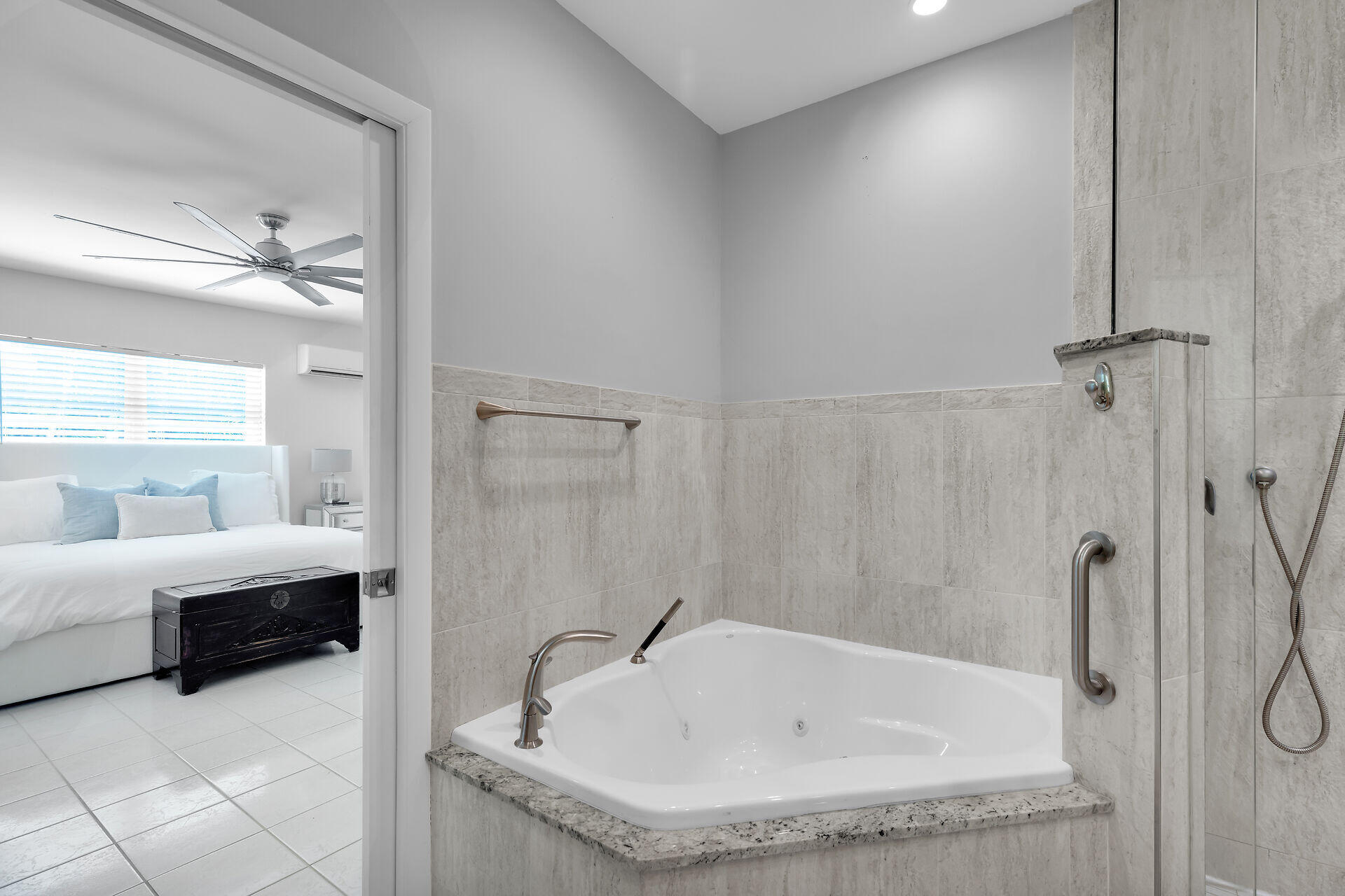 3722 Cindy Avenue Key West, FL 33040 - Photo 27 of 38 a bathroom with a tub and a shower
