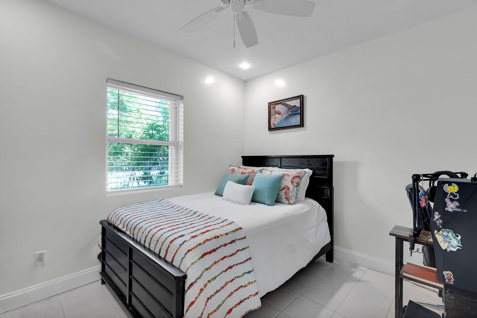 3722 Cindy Avenue Key West, FL 33040 - Photo 29 of 38 a bedroom with a bed and a window