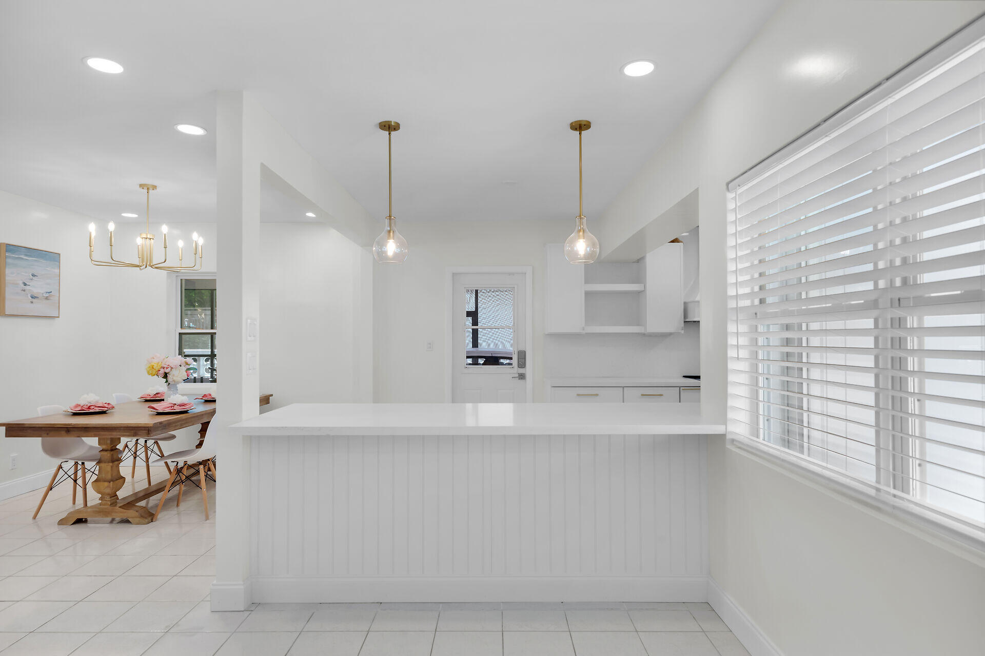 3722 Cindy Avenue Key West, FL 33040 - Photo 4 of 38 a large kitchen with a table and chairs