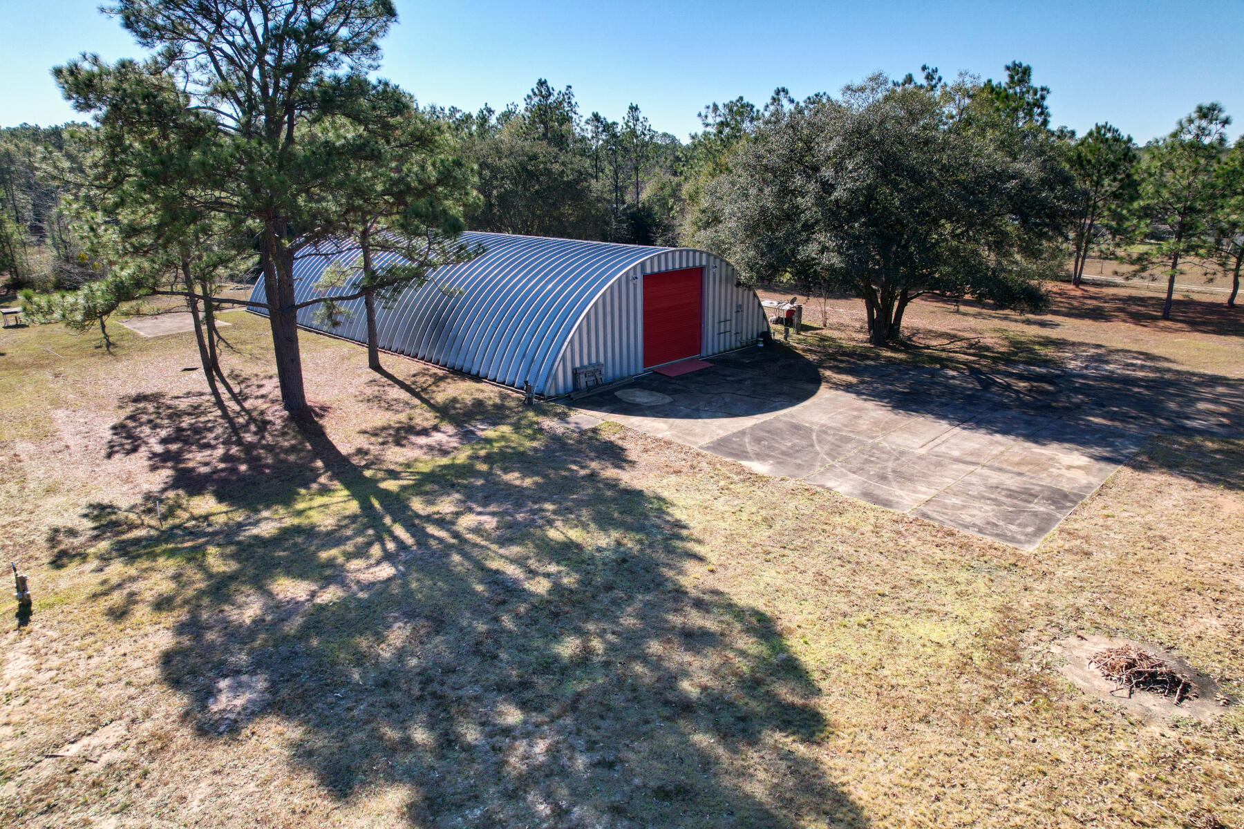 4156 Painter Branch Road Crestview, FL 32539 - Photo 3 of 23 a view of a backyard with barn