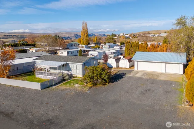 a view of a city with lawn chairs